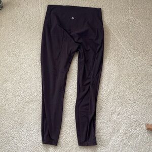 Lululemon brown three-quarter length size 10 leggings with side pockets